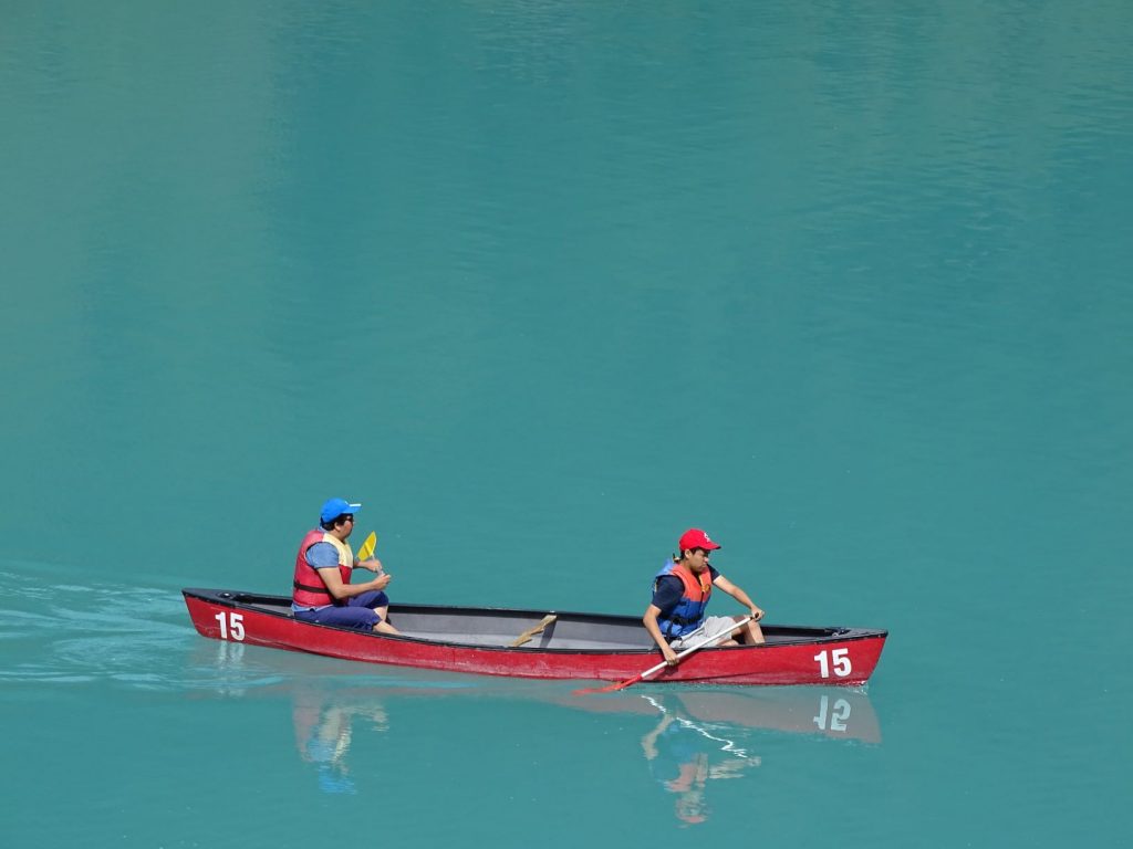 2 people in a paddle boat 