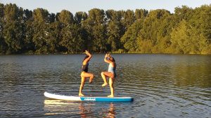 Yoga with kids on the SUP